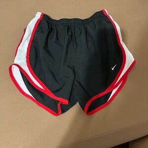Red and black Nike shorts 
XS
Perfect condition